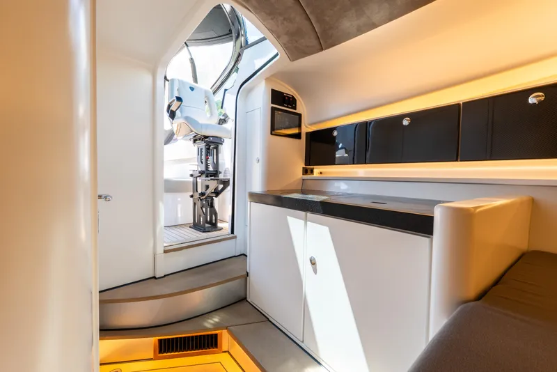 Slide: The Image of Luxurious interior of 2022 Wajer 38 yacht, featuring sleek cabinetry and modern seating. - 14