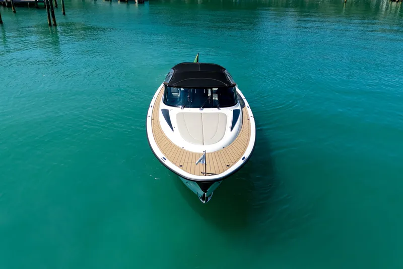 Slide: The Image of 2022 Wajer 38 boat on clear turquoise water, aerial view. - 2