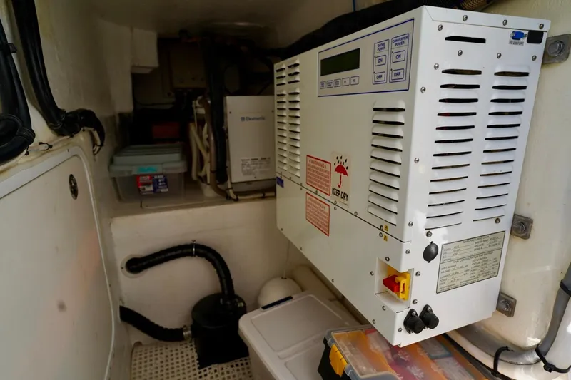 Slide: The Image of Electrical equipment compartment in a 2017 Intrepid 475 Sport Yacht. - 24