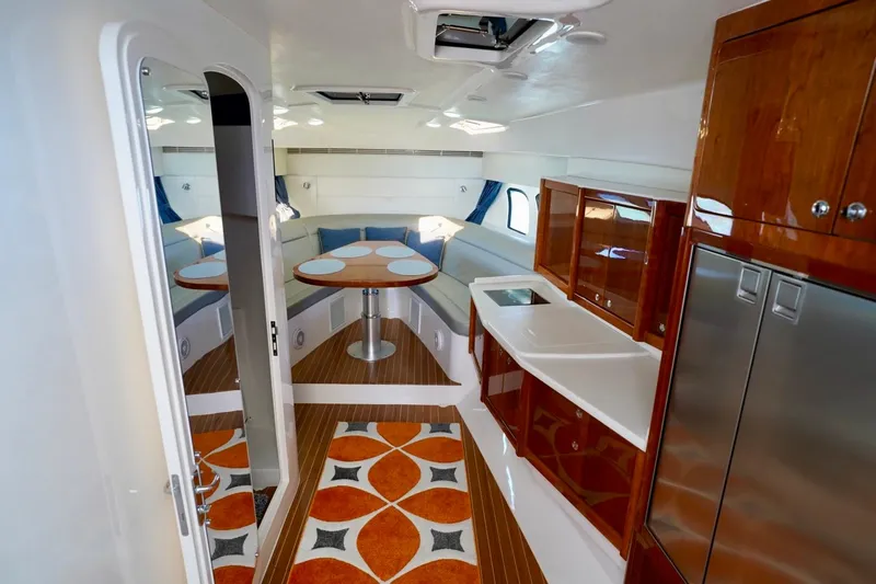 Slide: The Image of Luxurious interior of 2017 Intrepid 475 Sport Yacht with modern kitchen and cozy seating area. - 55