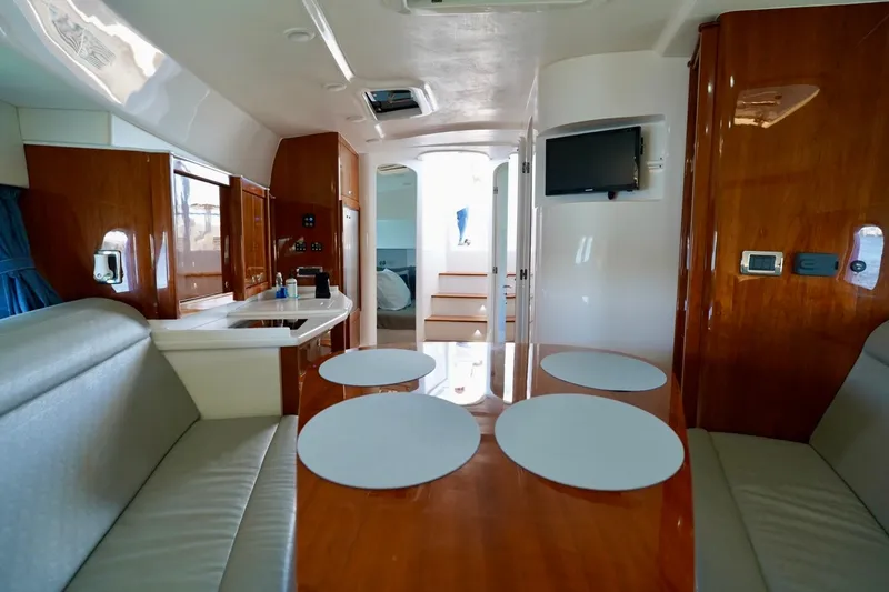 Slide: The Image of Luxurious interior of 2017 Intrepid 475 Sport Yacht with modern amenities and elegant wood finishes. - 60