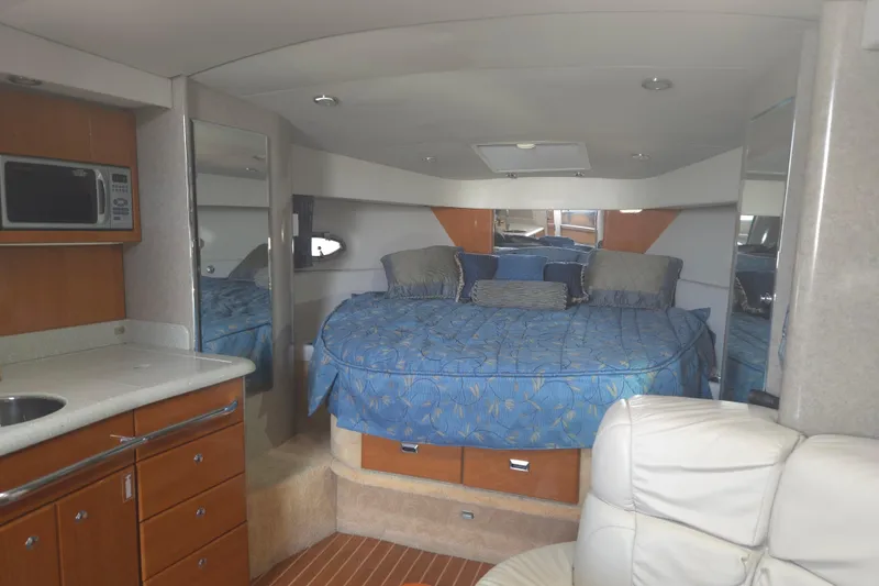 Slide: The Image of Interior of a 2005 Formula 37 Performance Cruiser with cozy bed and kitchenette. - 12
