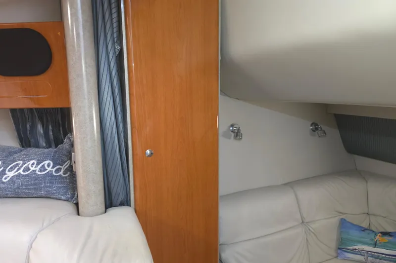 Slide: The Image of Interior of 2005 Formula 37 Performance Cruiser with cozy seating and decorative pillows. - 18