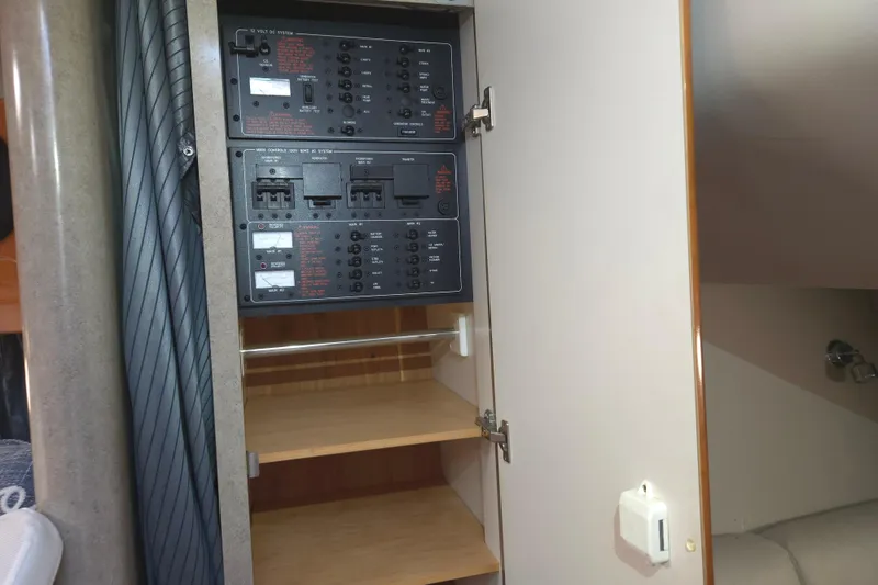 Slide: The Image of Electrical panel inside a 2005 Formula 37 Performance Cruiser yacht cabin. - 19