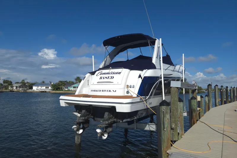 Slide: The Image of 2005 Formula 37 Performance Cruiser docked at Forked River, NJ, under clear blue skies. - 2