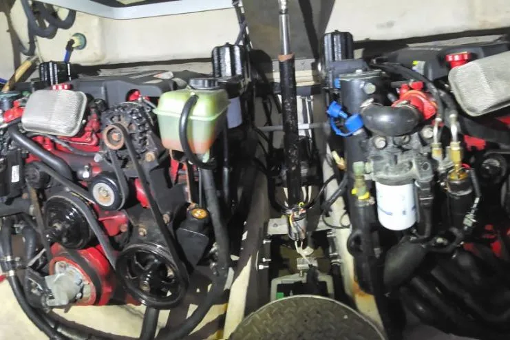 Slide: The Image of Engine compartment of a 2005 Formula 37 Performance Cruiser, showcasing dual engines and components. - 22