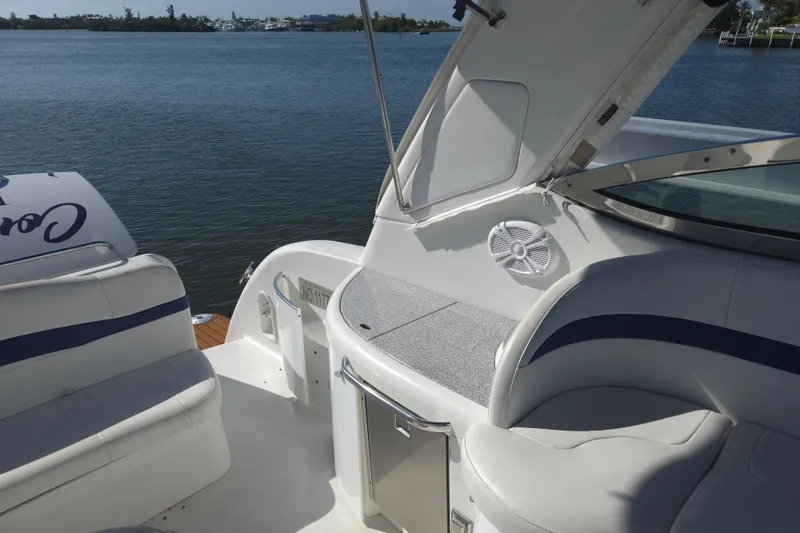 Slide: The Image of 2005 Formula 37 Performance Cruiser boat interior with seating and water view. - 29