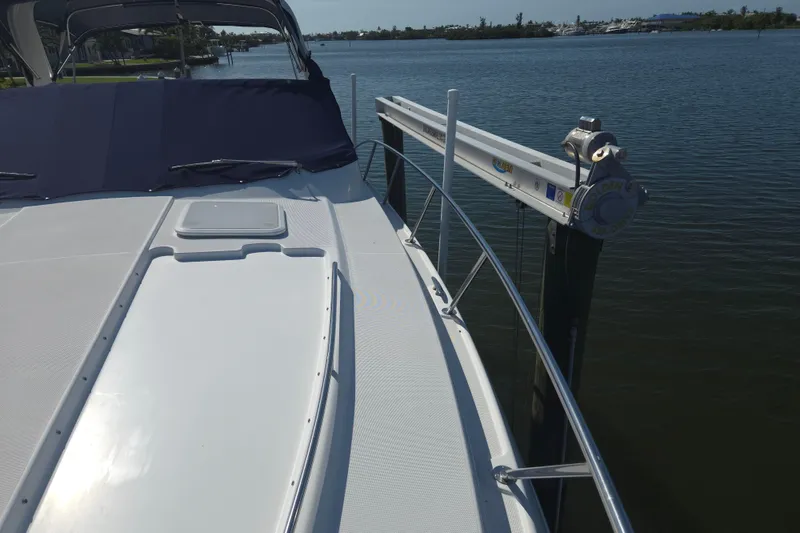 Slide: The Image of 2005 Formula 37 Performance Cruiser docked by calm waters. - 7