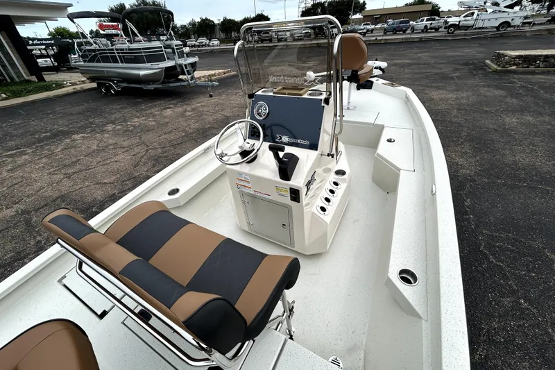 Slide: The Image of 2026 Xpress H20B Bay boat with sleek design and modern console features. - 10