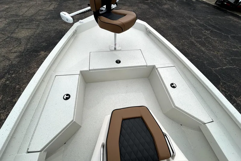 Slide: The Image of 2026 Xpress H20B Bay boat interior with seating and storage compartments. - 15