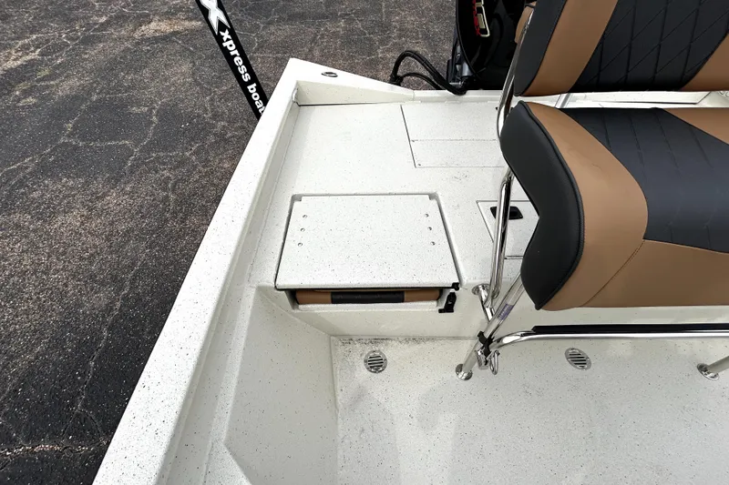 Slide: The Image of 2026 Xpress H20B Bay boat interior with seating and storage compartments. - 29