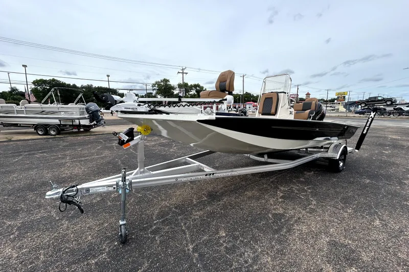 Slide: The Image of 2026 Xpress H20B Bay boat on trailer, featuring sleek design and modern equipment. - 3