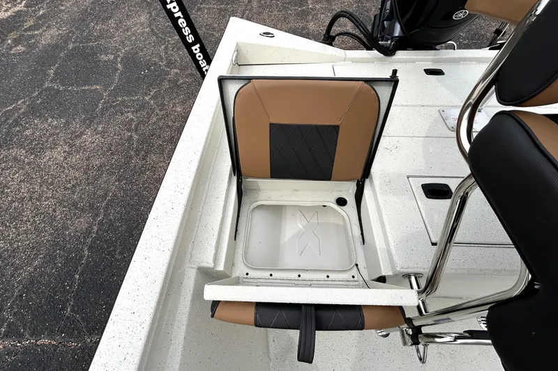 Slide: The Image of 2026 Xpress H20B Bay boat with foldable seat and storage compartment. - 31