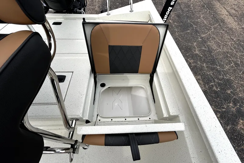 Slide: The Image of 2026 Xpress H20B Bay boat seat with storage compartment open. - 36