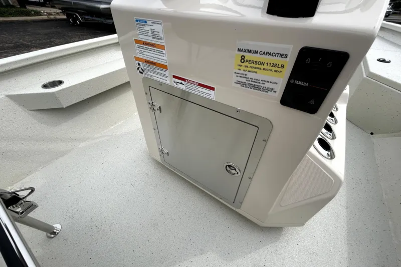 Slide: The Image of 2026 Xpress H20B Bay boat console with capacity labels and storage compartment. - 38