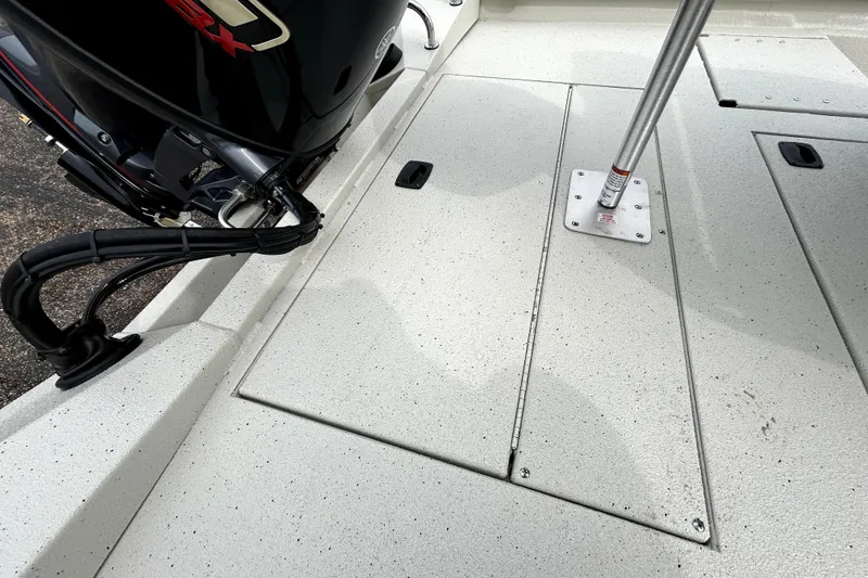 Slide: The Image of Xpress H20B Bay 2026 boat deck with motor view. - 42