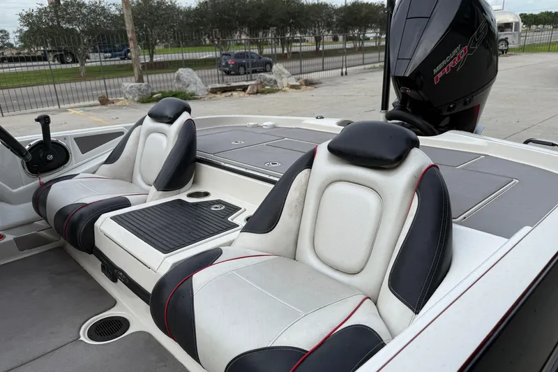 Slide: The Image of 2016 Ranger Z518C Intracoastal boat interior with dual seats and Mercury Pro XS engine. - 10
