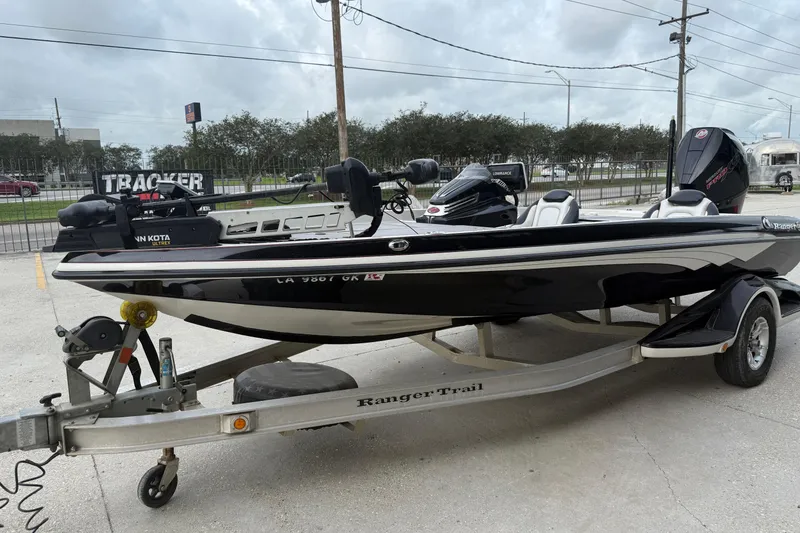 Slide: The Image of 2016 Ranger Z518C Intracoastal boat on trailer, parked outdoors. - 8
