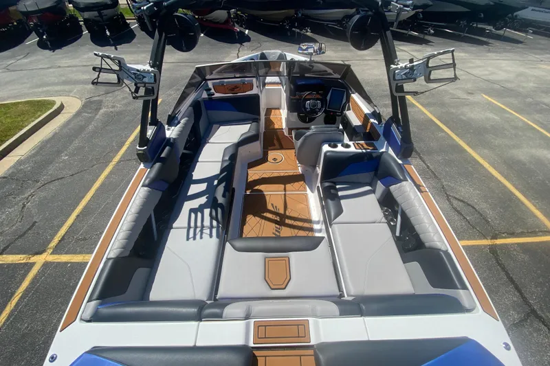 Slide: The Image of 2021 Tigé Z3 boat interior with sleek seating and modern dashboard. - 10