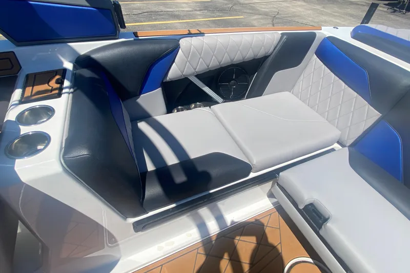 Slide: The Image of 2021 Tigé Z3 boat interior with stylish seating and cup holders. - 16