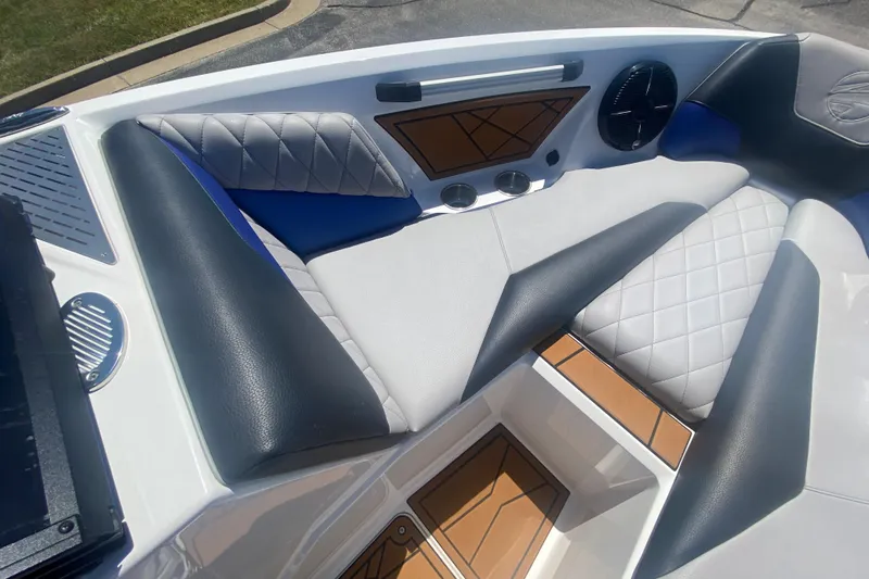 Slide: The Image of Interior of 2021 Tigé Z3 boat with cushioned seating and modern design elements. - 23