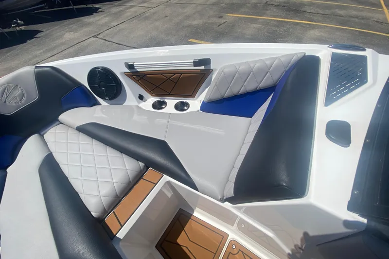 Slide: The Image of 2021 Tigé Z3 boat interior with cushioned seating and speaker system. - 24
