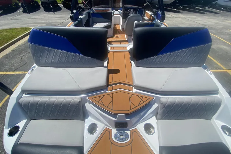 Slide: The Image of 2021 Tigé Z3 boat interior with luxurious seating and modern design. - 8