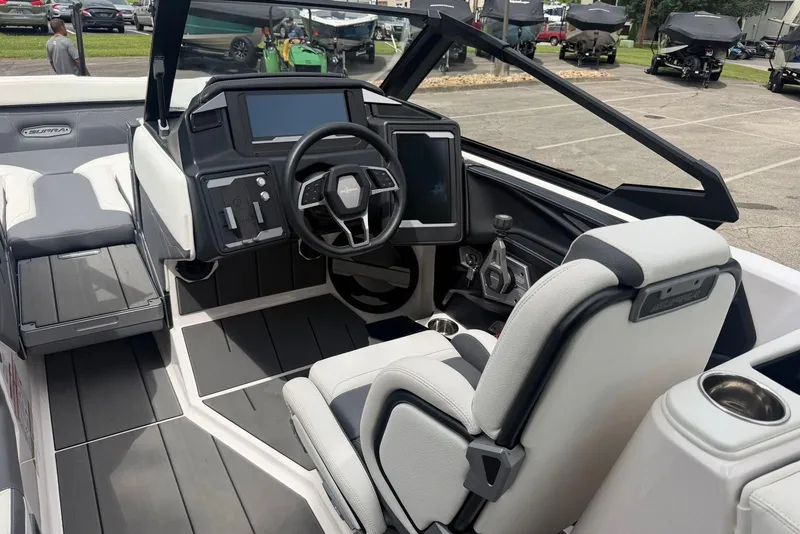 Slide: The Image of 2024 Supra SE 550 boat interior with modern dashboard and steering wheel. - 7