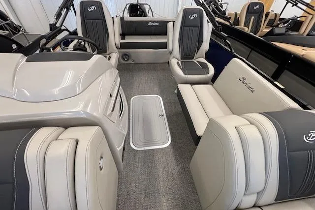 Slide: The Image of 2026 Barletta Corsa 23UC boat interior with luxurious seating and modern design. - 11