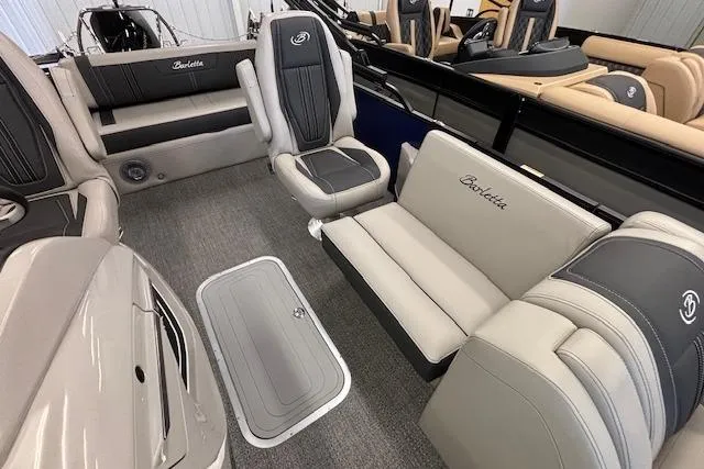 Slide: The Image of 2026 Barletta Corsa 23UC boat interior with luxurious seating and modern design. - 12