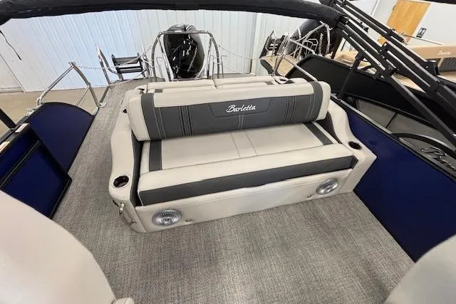 Slide: The Image of 2026 Barletta Corsa 23UC boat interior with plush seating and modern design. - 16