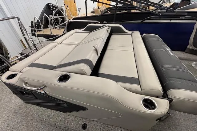 Slide: The Image of 2026 Barletta Corsa 23UC boat interior with beige and black seating. - 19