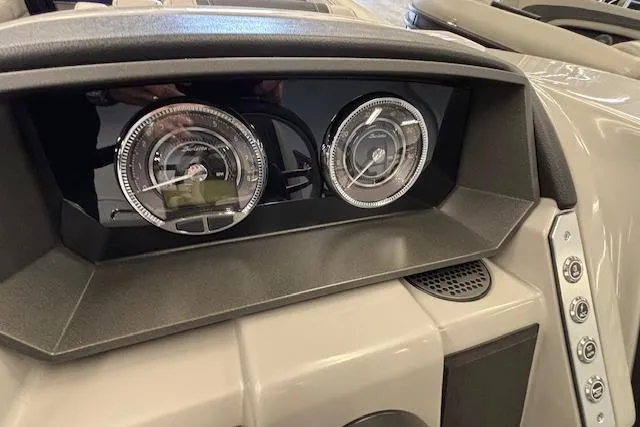 Slide: The Image of Dashboard of 2026 Barletta Corsa 23UC boat with modern gauges and controls. - 29