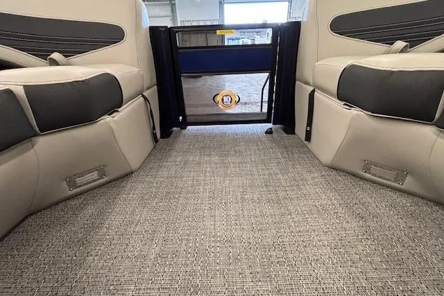 Slide: The Image of Interior view of 2026 Barletta Corsa 23UC pontoon boat with plush seating and carpeted flooring. - 33