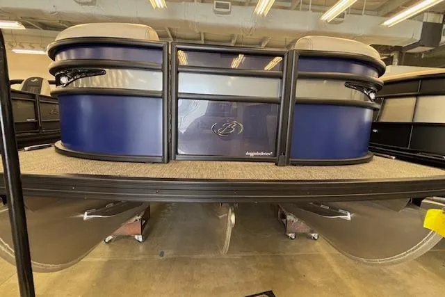 Slide: The Image of 2026 Barletta Corsa 23UC pontoon boat in showroom, featuring sleek design and modern amenities. - 7