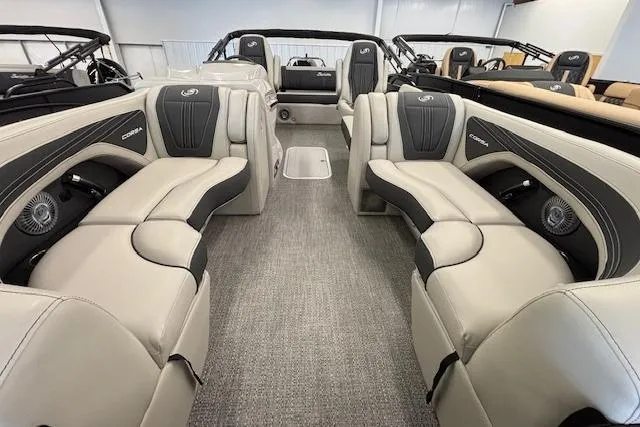 Slide: The Image of Interior view of 2026 Barletta Corsa 23UC pontoon boat with luxurious seating. - 9