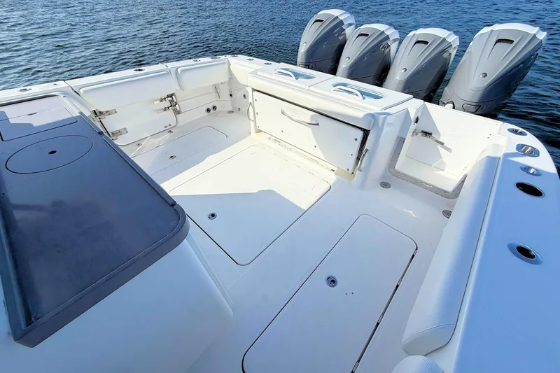 Slide: The Image of 2020 HCB 42 Siesta boat deck with four powerful outboard engines. - 14