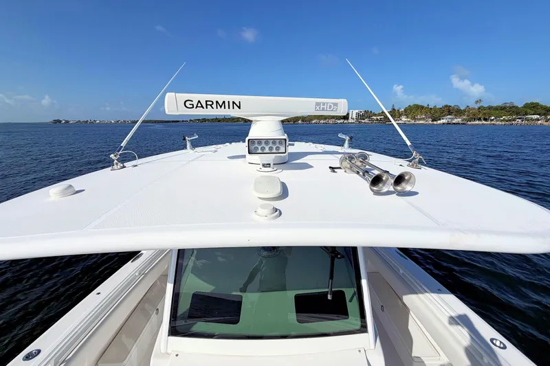 Slide: The Image of 2020 HCB 42 Siesta boat with Garmin radar on open water. - 24