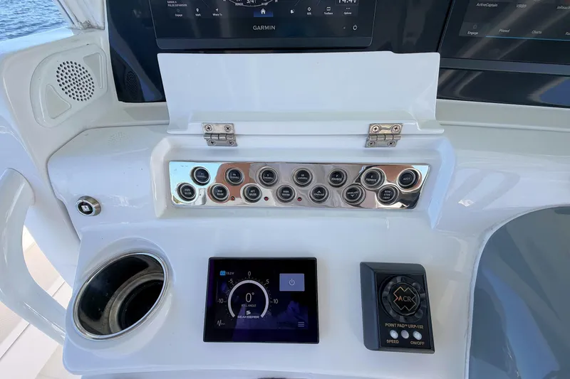 Slide: The Image of Control panel of 2020 HCB 42 Siesta boat with navigation and electronic controls. - 9