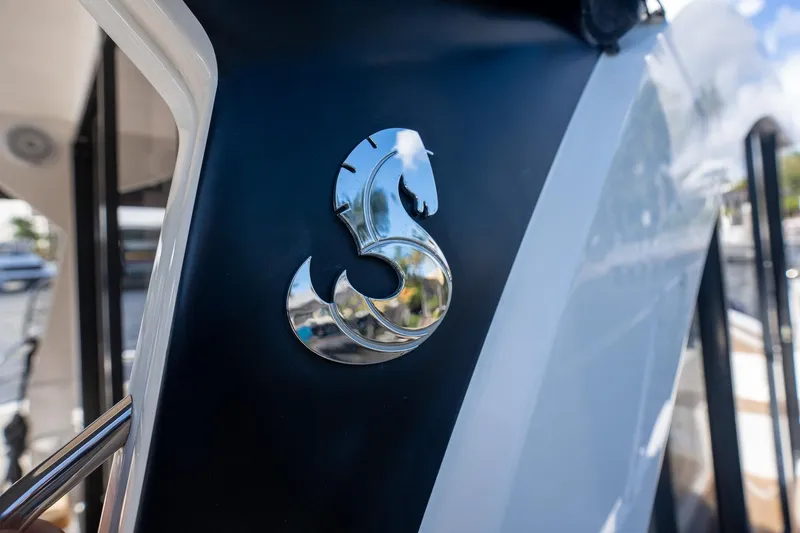 Slide: The Image of 2021 Beneteau Antares 9 boat with chrome seahorse logo detail. - 20