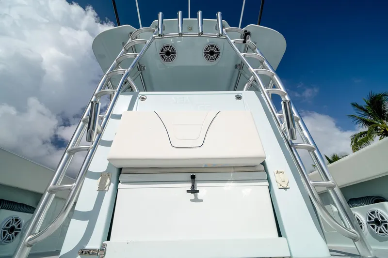 Slide: The Image of 2023 SeaVee 390Z boat with ladder and speakers under a blue sky. - 31