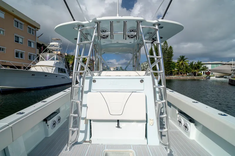 Slide: The Image of 2023 SeaVee 390Z boat docked, featuring sleek design and modern amenities. - 33