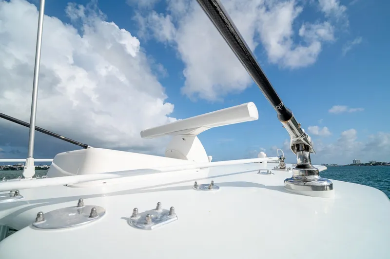 Slide: The Image of 2023 SeaVee 390Z boat deck with clear blue sky and ocean view. - 41
