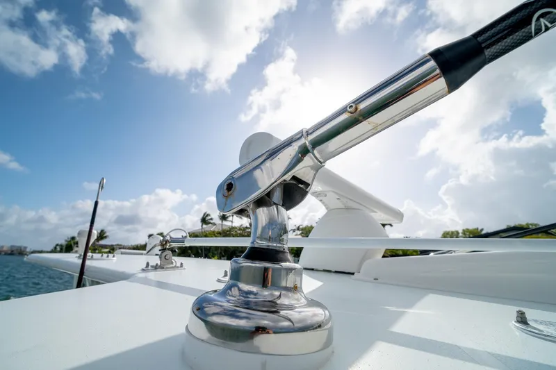 Slide: The Image of Close-up of a 2023 SeaVee 390Z boat detail against a bright sky. - 44