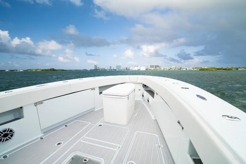Slide: The Image of 2023 SeaVee 390Z boat deck with ocean and city skyline view. - 47