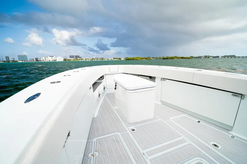 Slide: The Image of 2023 SeaVee 390Z boat deck with ocean view and city skyline. - 51