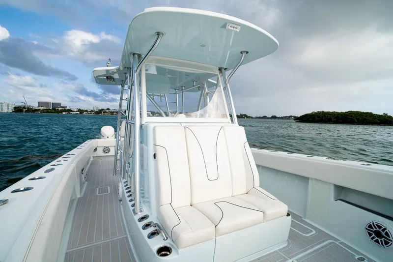 Slide: The Image of 2023 SeaVee 390Z boat on water, featuring sleek design and comfortable seating. - 53