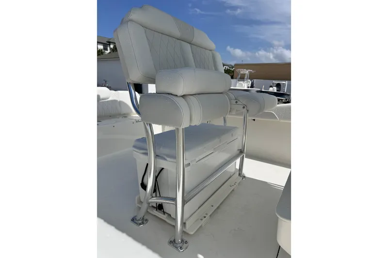 Slide: The Image of 2026 Key West 239 FS boat seat with white upholstery and stainless steel frame. - 11