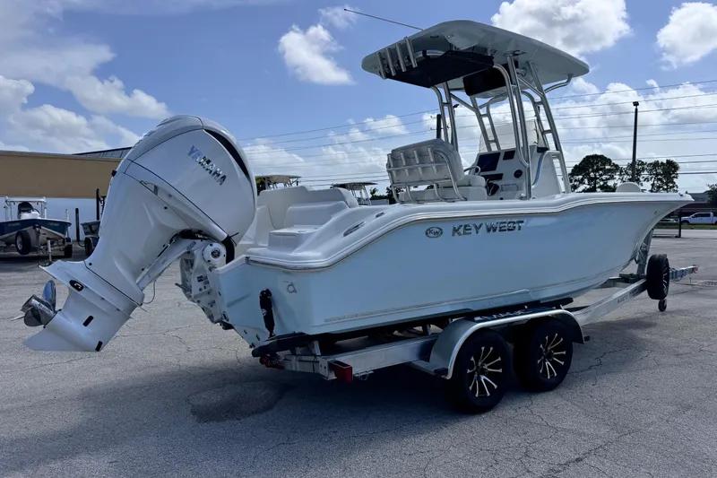 Slide: The Image of 2026 Key West 239 FS boat on trailer, featuring Yamaha outboard motor. - 4