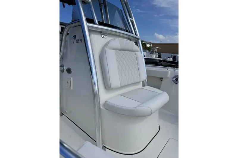 Slide: The Image of 2026 Key West 239 FS boat seat with white upholstery and sleek design. - 8